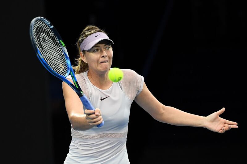 MELBOURNE, AUSTRALIA - JANUARY 20:  Maria Sharapova of Russia plays a forehand in her third round match against Angelique Kerber of Germany on day six of the 2018 Australian Open at Melbourne Park on January 20, 2018 in Melbourne, Australia.  (Photo by Quinn Rooney/Getty Images)