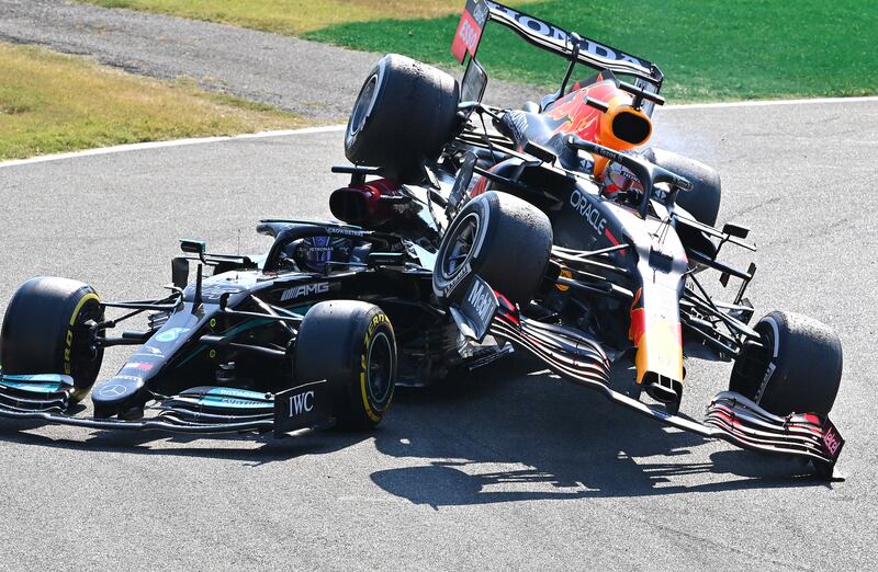 Hamilton's Mercedes collides with Max Verstappen of  Red Bull Racing during the Italian GP at Monza. Getty Images