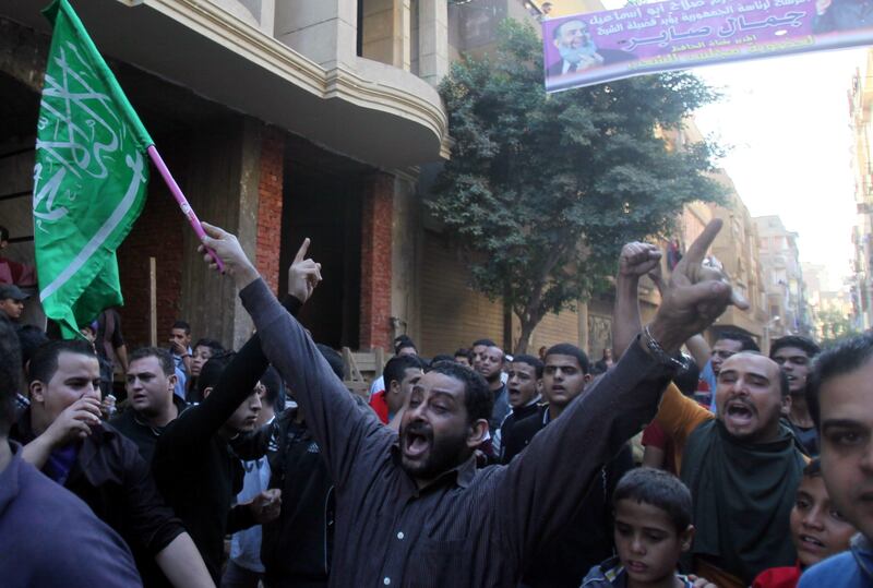 epa03006714 Egyptian Muslims protest after clashes between Coptic Christians and residents in the Shubra neighborhood, Cairo, Egypt, 17 November 2011. According to media reports, seven people were injured when clashes erupted between residents and Coptic Christians marching from the Shubra neighborhood towards the Egyptian State Radio and Television building in remembrance of the victims killed in clashes last October.  EPA/KHALED ELFIQI *** Local Caption ***  03006714.jpg