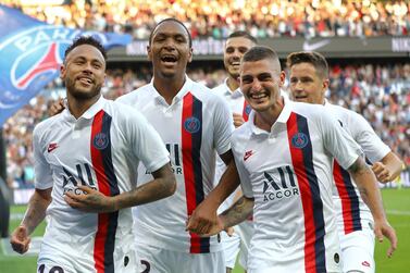  Neymar, left, celebrates after scoring the winner for Paris Saint-Germain against Strasbourg at the Parc des Princes on Saturday. EPA
