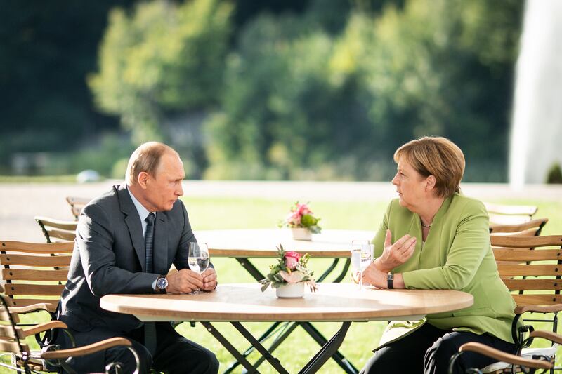 Mrs Merkel and Mr Putin meet at Schloss Meseberg palace, the German government retreat, in August  2018. Getty Images