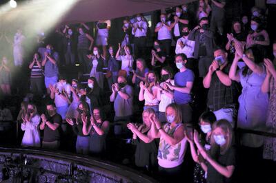 Guests applaud at the end of a performance of the West End show 'The Show Must Go On' at the Palace Theatre, amid the spread of coronavirus disease (COVID-19) in London, Britain, June 2, 2021. REUTERS/Henry Nicholls