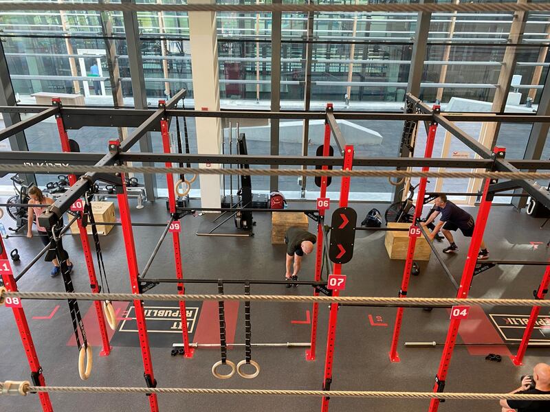 People exercise at a gym while maintaining social distancing in Dubai. Reuters