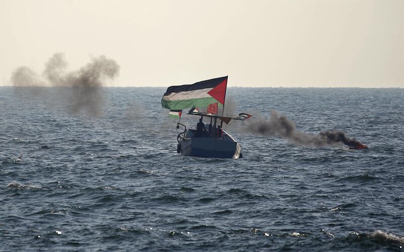 Palestinian protesters in boats take part in a demonstration near the maritime border with Israel in the northern Gaza Strip.  AFP
