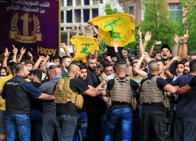  SENSITIVE MATERIAL. THIS IMAGE MAY OFFEND OR DISTURB    Lebanese army try to block supporters of the Lebanese Shi'ite groups Hezbollah and Amal as they gesture and chant slogans against anti-government demonstrators, in Beirut, Lebanon June 6, 2020. REUTERS/Ali Hashisho