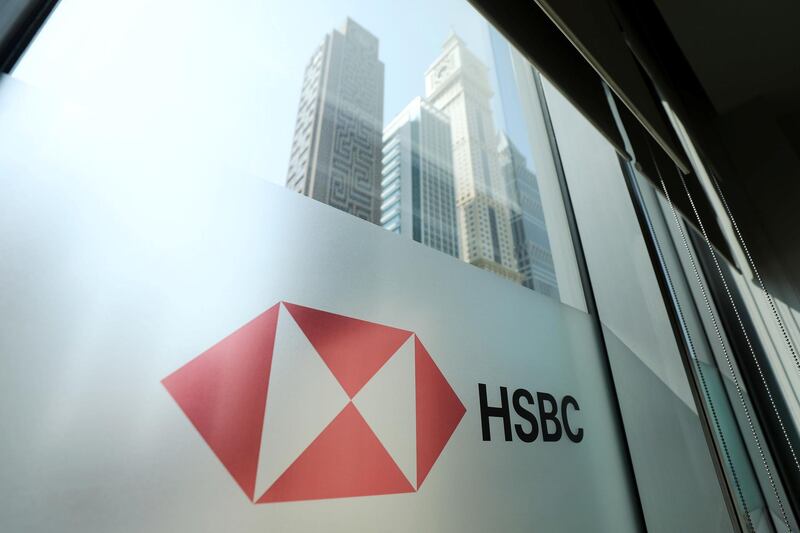 Dubai, United Arab Emirates - August 07, 2019: Stock. A HSBC bank sign in the DIFC. Wednesday the 7th of August 2019. DIFC, Dubai. Chris Whiteoak / The National