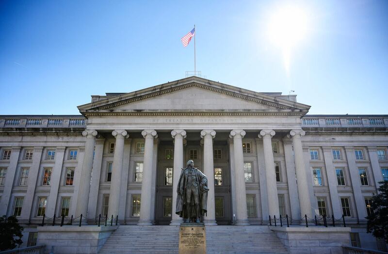 (FILES) In this file photo taken on October 18, 2018 (FILES) In this file photo taken on October 18, 2018, the US Treasury Department building in Washington, DC. The US has hit Iran's petrochemical group PGPIC with economic sanctions due to its ties with the country's Revolutionary Guards (IRGC), the Treasury Department announced on June 7, 2019. The move aims to choke off financing to the country's largest and most profitable petrochemical group and extends to its 39 subsidiaries and "foreign-based sales agents," the Treasury Department said in a statement. / AFP / MANDEL NGAN
