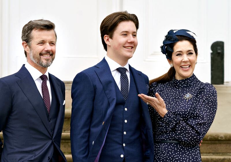 Crown Prince Frederik and Crown Princess Mary with their son, Prince Christian, at Fredensborg Castle Church, in 2021. AFP