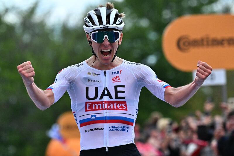 UAE Team Emirates rider Tadej Pogacar celebrates after winning Stage 2 of the Giro d'Italia on May 5, 2024. EPA 