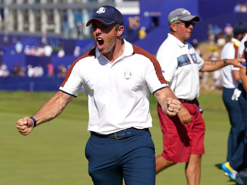 Team Europe's Rory McIlroy celebrates on the 17th following the foursomes on day two of the 44th Ryder Cup at the Marco Simone Golf and Country Club, Rome. PA