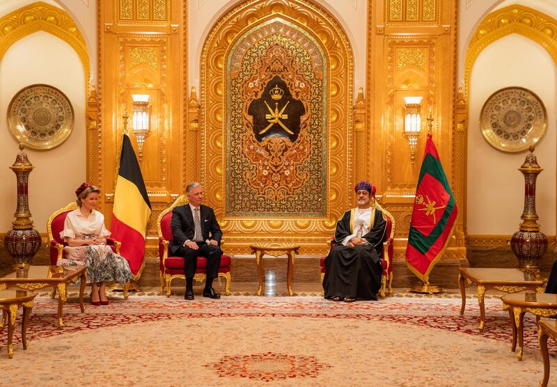 Queen Mathilde wears a Maison Natan taffeta dress to meet Sultan Haitham. Photo: Oman News Agency