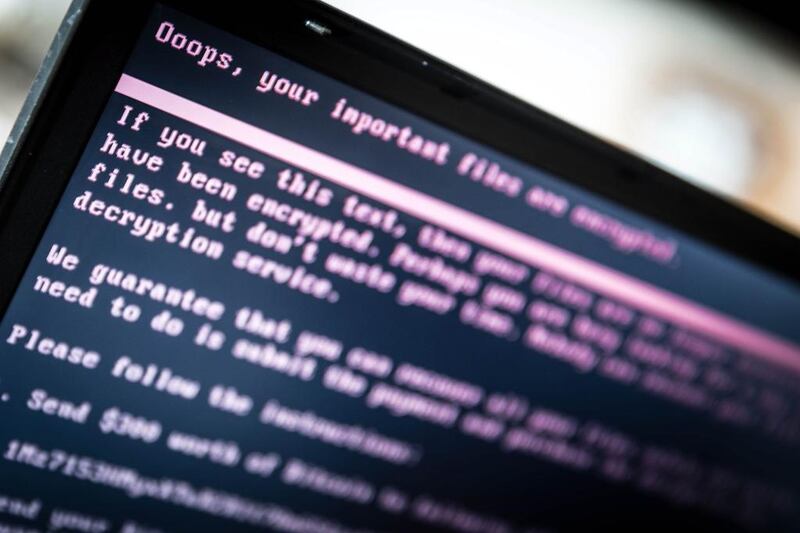 A laptop screen in Geldrop, the Netherlands displays a message after it was infected with the ransomware. Rob Engelaar / EPA