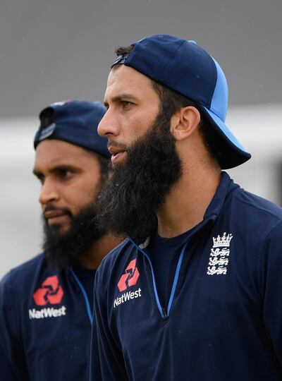 TAURANGA, NEW ZEALAND - FEBRUARY 27:  England spinners Adil Rashid (l) and Moeen Ali look on during nets ahead of the 2nd ODI at the Bay Oval on February 27, 2018 in Tauranga, New Zealand.  (Photo by Stu Forster/Getty Images)