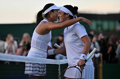 Ons Jabeur embraces Moyuka Uchijima following her 6-3, 6-1 victory over the Japanese in her opening round match at Wimbledon. AFP