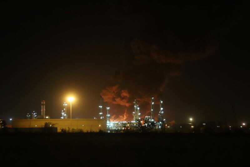 Smoke rises at an oil refinery in Tehran. Reuters