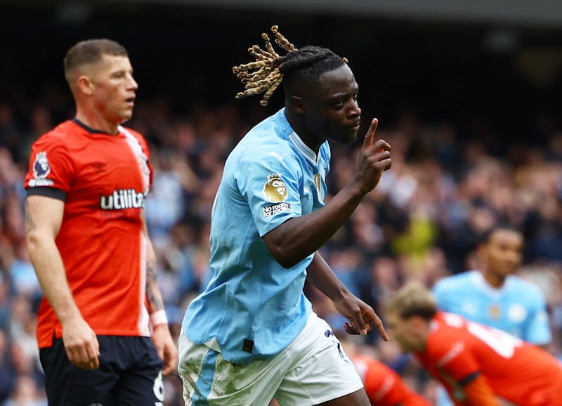 Manchester City's Jeremy Doku celebrates scoring their fourth goal. Reuters