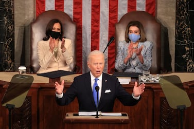 US President Joe Biden addresses a joint session of Congress as President Kamala Harris and Speaker of the House Representative Nancy Pelosi applause at the US Capitol in Washington on April 28, 2021. Reuters