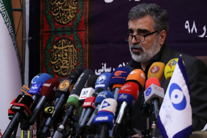 In this photo released by the Atomic Energy Organization of Iran, spokesman of the organization Behrouz Kamalvandi speaks in a news briefing in Tehran, Iran, Saturday, Sept. 7, 2019. Iran has begun injecting uranium gas into advanced centrifuges in violation of its 2015 nuclear deal with world powers, Kamalvandi said. (Atomic Energy Organization of Iran via AP)