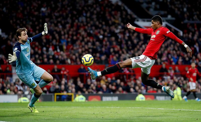 Manchester United's Marcus Rashford scores his side's first goal of the game during the Premier League match at Old Trafford, Manchester. PA Photo. Picture date: Saturday January 11, 2020. See PA story SOCCER Man Utd. Photo credit should read: Martin Rickett/PA Wire. RESTRICTIONS: EDITORIAL USE ONLY No use with unauthorised audio, video, data, fixture lists, club/league logos or "live" services. Online in-match use limited to 120 images, no video emulation. No use in betting, games or single club/league/player publications.