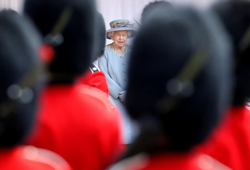 Dubbed a mini Trooping the Colour, it featured soldiers in ceremonial scarlet coats and bearskin hats. Reuters