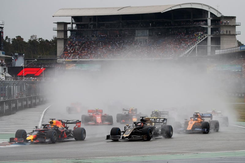 Verstappen leads in the wet on his way to victory. EPA