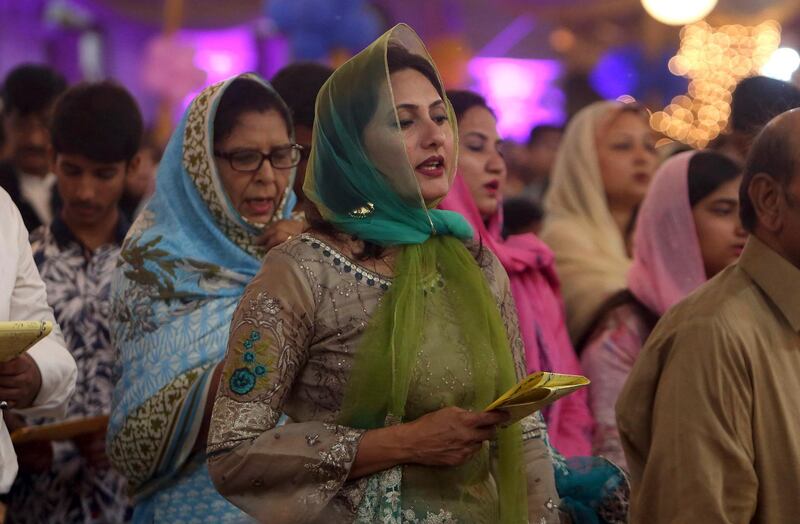 Pakistani Christians attend early morning Easter mass at St. Patric Church in Karachi, Pakistan. AP