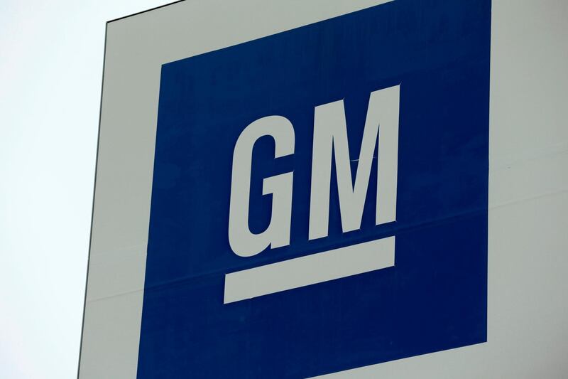 (FILES) In this file photo taken on January 27, 2020 a sign with the General Motors (GM) logo is seen outside the GM Detroit- Hamtramck assembly plant in Detroit, Michigan. President Donald Trump on March 27, 2020 ordered General Motors to manufacture critical care ventilators as the United States grapples with the mounting number of coronavirus cases.The pivot will be no easy feat for the auto giant, requiring the company to train employees, procure supplies and respect strict manufacturing guidelines.
 / AFP / JEFF KOWALSKY
