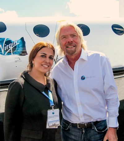 Namira Salim, who will fly on a Virgin Galactic space tourism flight on October 5, with company founder Sir Richard Branson. Photo: Namira Salim