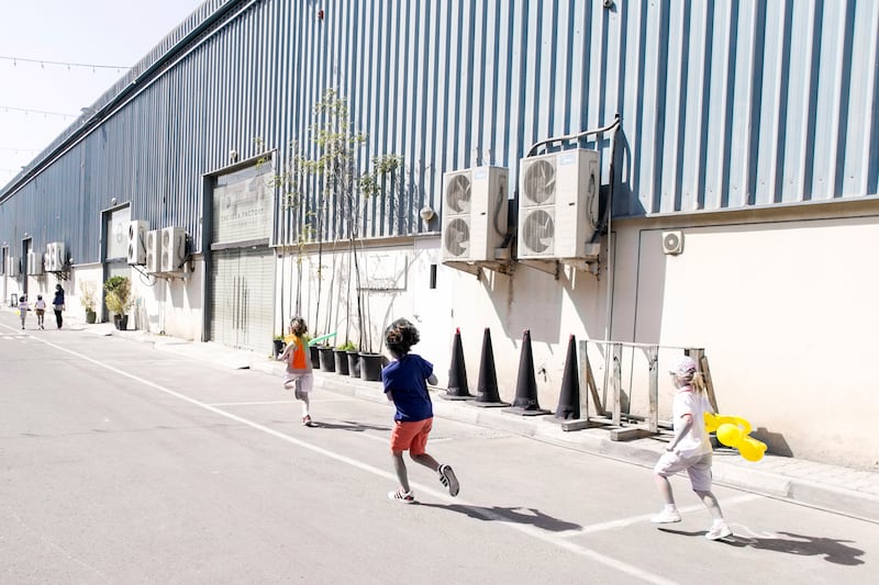 DUBAI, UNITED ARAB EMIRATES, 27 JAN 2017. 
A group of kids run in Al Serkal Avenue during Al Quoz Art Festival.
Photo: Reem Mohammed / The National (Section: NA) ID 26245 *** Local Caption ***  RM_20170128_NA_QUOZ_004.JPG