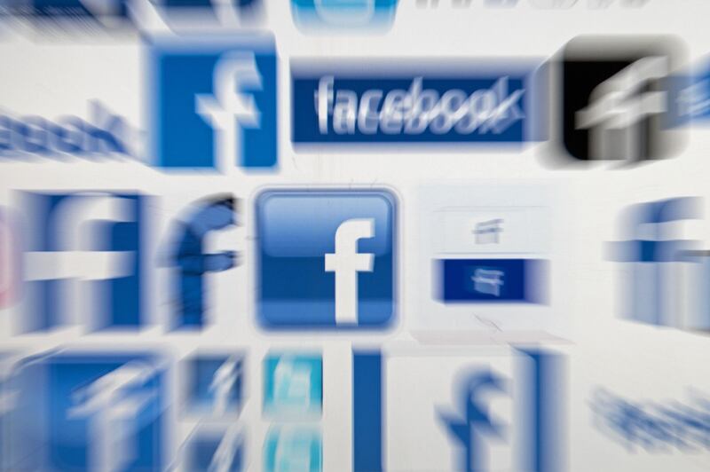 A computer screen displays logos associated with the social networking site Facebook, taken in Manchester, England on March 22, 2018.
A public apology by Facebook chief Mark Zuckerberg failed Thursday to quell outrage over the hijacking of personal data from millions of people, as critics demanded the social media giant go much further to protect privacy. / AFP PHOTO / Oli SCARFF