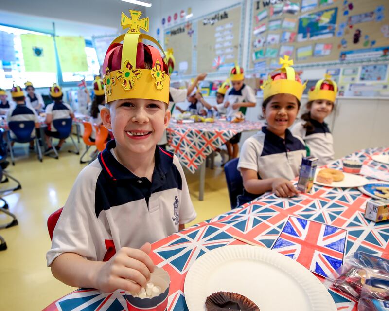 Tea parties with cake and finger sandwiches were held on the last day of school before the coronation. Victor Besa / The National