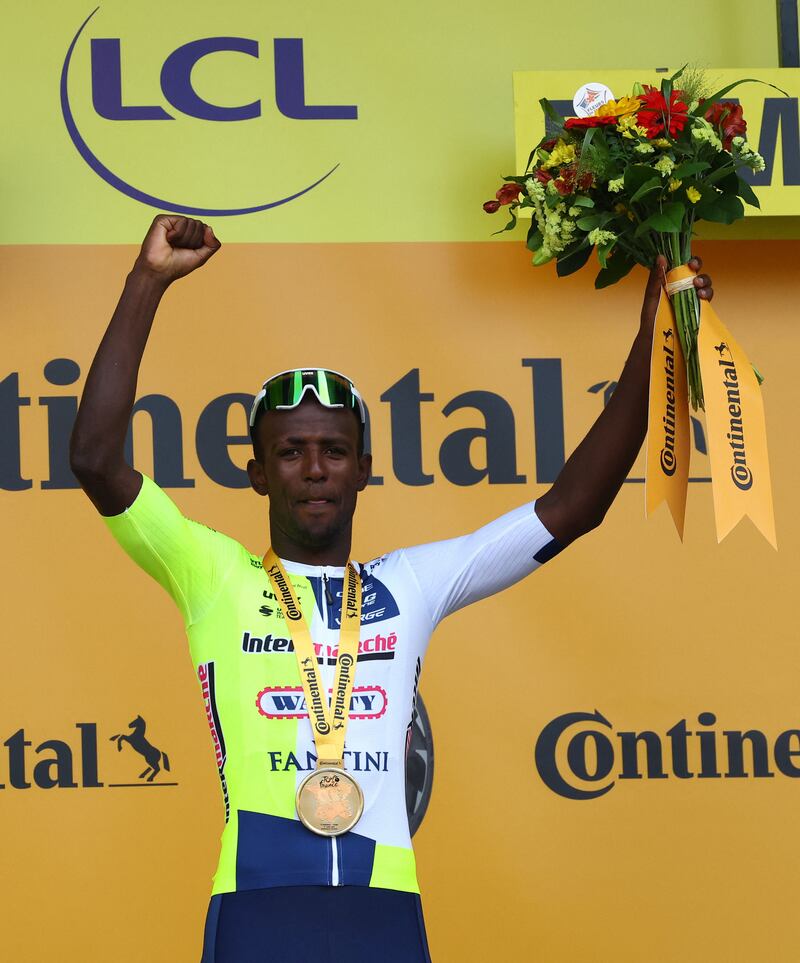 Intermarche-Wanty's Biniam Girmay celebrates on the podium after winning Stage 3. Reuters