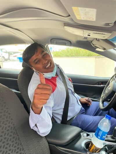 Taxi driver Anwar Abdulrahman gestures after returning the wallet, containing Dh4,000, to its owner in Dubai. Photo: Louise Belton