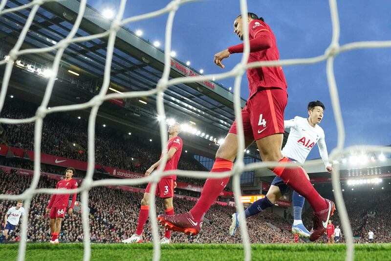 Tottenham forward Son Heung-min, right, celebrates after scoring his side's opening goal against Liverpool. AP