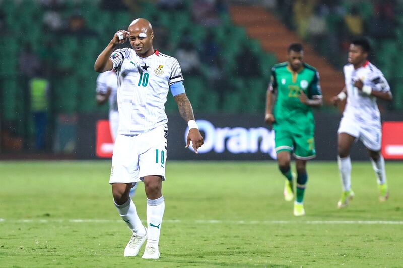 Ghana forward Andre Ayew leaves the field after receiving a red card. AFP