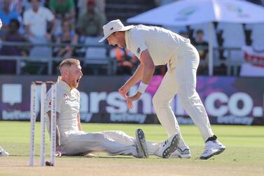 Ben Stokes, left, and Stuart Broad celebrate the wicket of South Africa's Anrich Nortje. AP