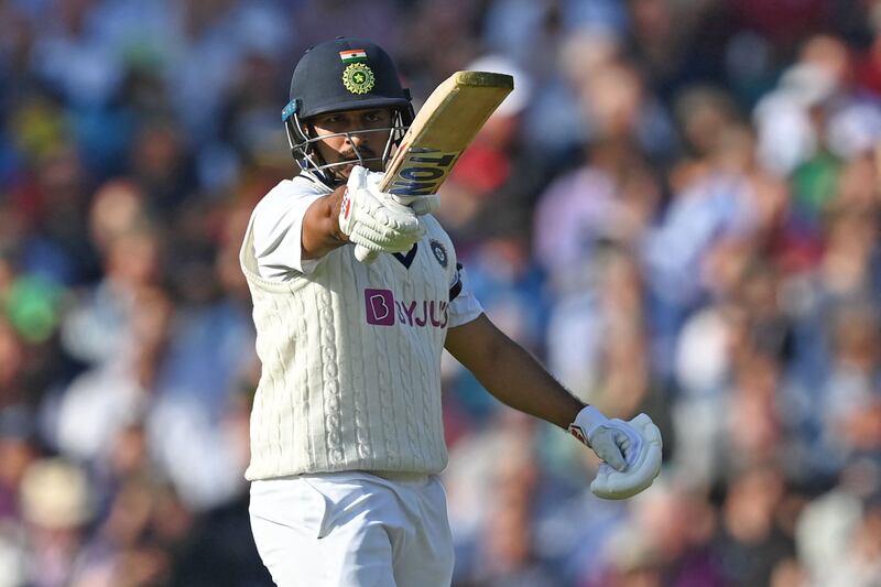 India's Shardul Thakur celebrates reaching 50, the fastest ever half-century at The Oval, beating Ian Botham's record. AFP
