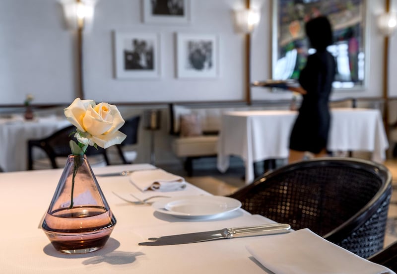 Abu Dhabi, United Arab Emirates, June 15, 2020.   
 Distanced tables at the Cafe Milano at the Four Seasons Hotel, Abu Dhabi.
Victor Besa  / The National
Section:  If
Reporter:  Janice Rodrigues