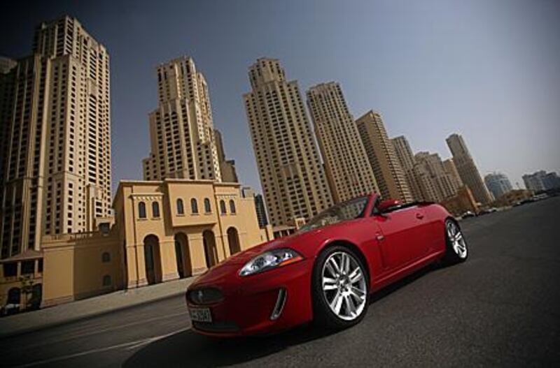 The 2010 Jaguar XK-R convertible blends raw power with supple handling and generous cushioning.