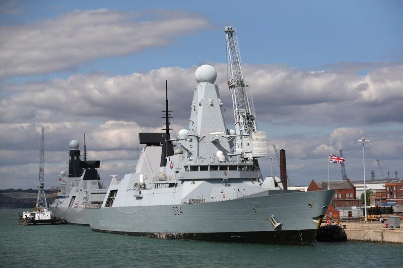 PORTSMOUTH, ENGLAND - AUGUST 12:  The Royal Navy's  type 45 Destroyer HMS Diamond, moored in Portsmouth Naval Base, on August 12, 2013 in Portsmouth, England. Three Royal Navy warships have set sail for the Mediterranean for a routine deployment amid increased tensions between Britain and Spain over the sovereignty of Gibraltar. The Ministry of Defence has described the warship's movements as 'long-planned' and part of 'a range of regular and routine deployments'.  (Photo by Oli Scarff/Getty Images)