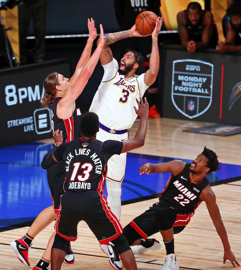 Lakers' forward Anthony Davis shoots over Miami Heat forward Kelly Olynyk. USA TODAY Sports