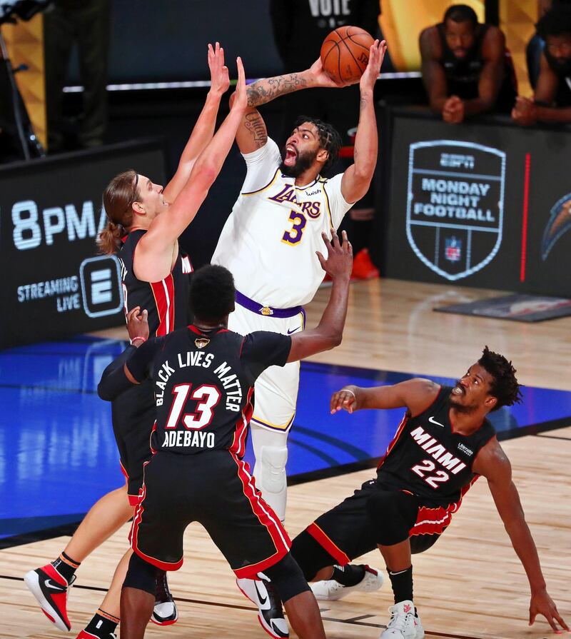 Lakers' forward Anthony Davis shoots over Miami Heat forward Kelly Olynyk. USA TODAY Sports