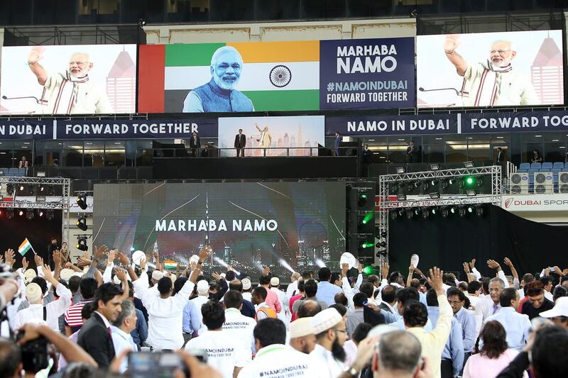 The Indian prime minister waves goodbye to the audience after his speech. Pawan Singh / The National