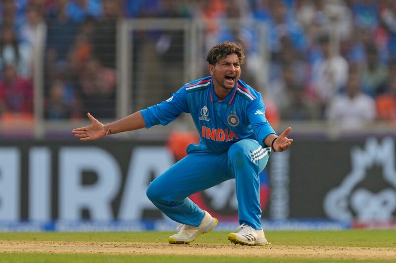 India's Kuldeep Yadav successfully appeals successfully for the lbw against Pakistan's Saud Shakeel. AP 