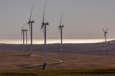 Wind turbines operate at the West Coast One wind farm near Vredenburg in South Africa. Bloomberg