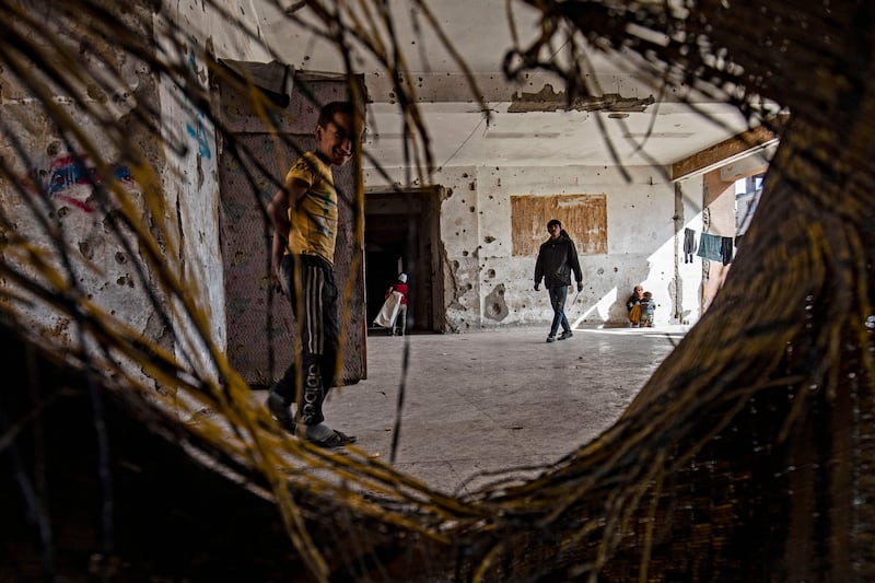 Displaced Syrians living in war-damaged buildings in the rebel-held northern city of Raqqa. AFP