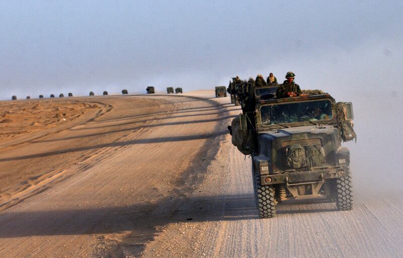 A convoy of US marines crosses the desert near Diwaniya in central Iraq on April 4, 2003. AFP