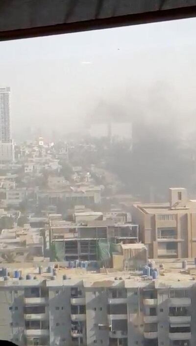 Smoke rises from the Chinese consulate after an attack by gunmen in Karachi, Pakistan, November 23, 2018 in this still image taken from a video obtained from social media. Saqib Zia/via REUTERS THIS IMAGE HAS BEEN SUPPLIED BY A THIRD PARTY. MANDATORY CREDIT. NO RESALES. NO ARCHIVES.