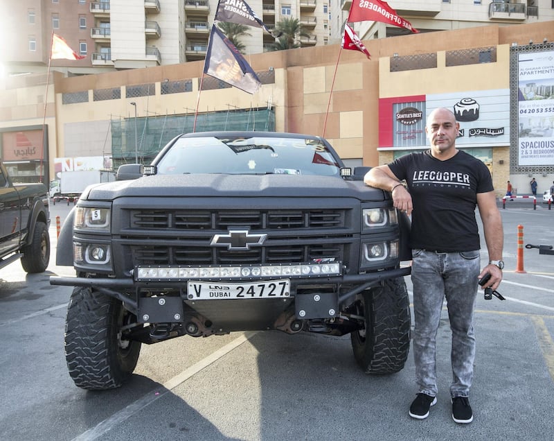 DUBAI, UNITED ARAB EMIRATES -Fadi, owner of Chevy Hercules model 2014 with modified body texture and fully modified with bajakits King of the Trucks winner at UAE Offroaders Show at Al Ghurair Centre.  Leslie Pableo for The National for Adam Workman's story