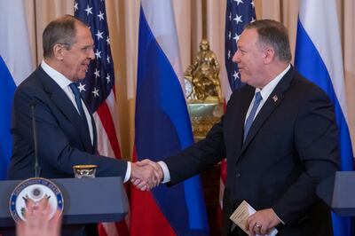 epa08060893 US Secretary of State Mike Pompeo (R) shakes hands with Russian Foreign Minister Sergey Lavrov (L) after a press conference at the Department of State in Washington, DC, USA, 10 December 2019. Lavrov is scheduled to meet with US President Donald J. Trump at the White House later in the day.  EPA/ERIK S. LESSER